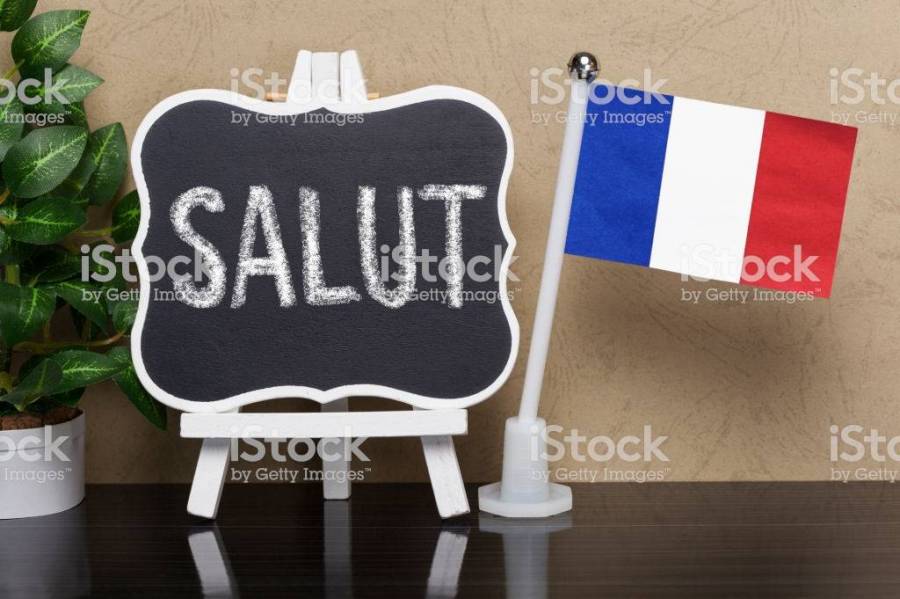 Blackboard with text ,, Salut " and flag of France